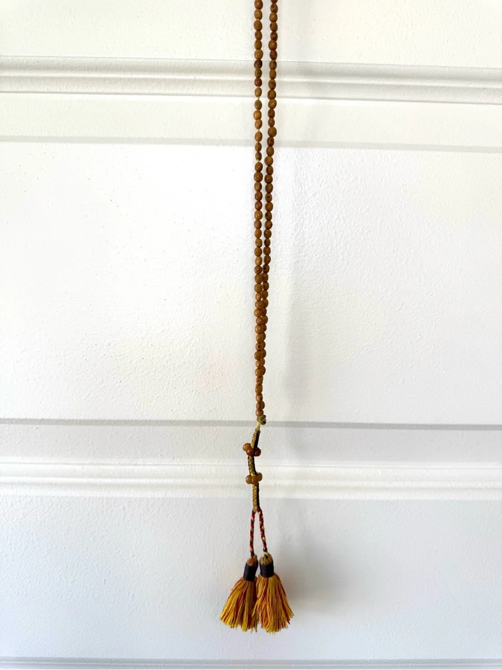 Meditation Beads: Knotted Chord with Small Beaded Sections and Tassels.